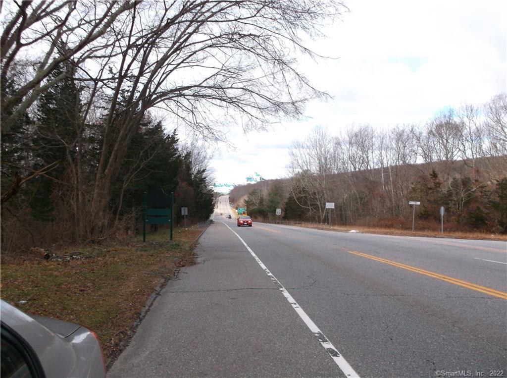 a view of a road with a yard