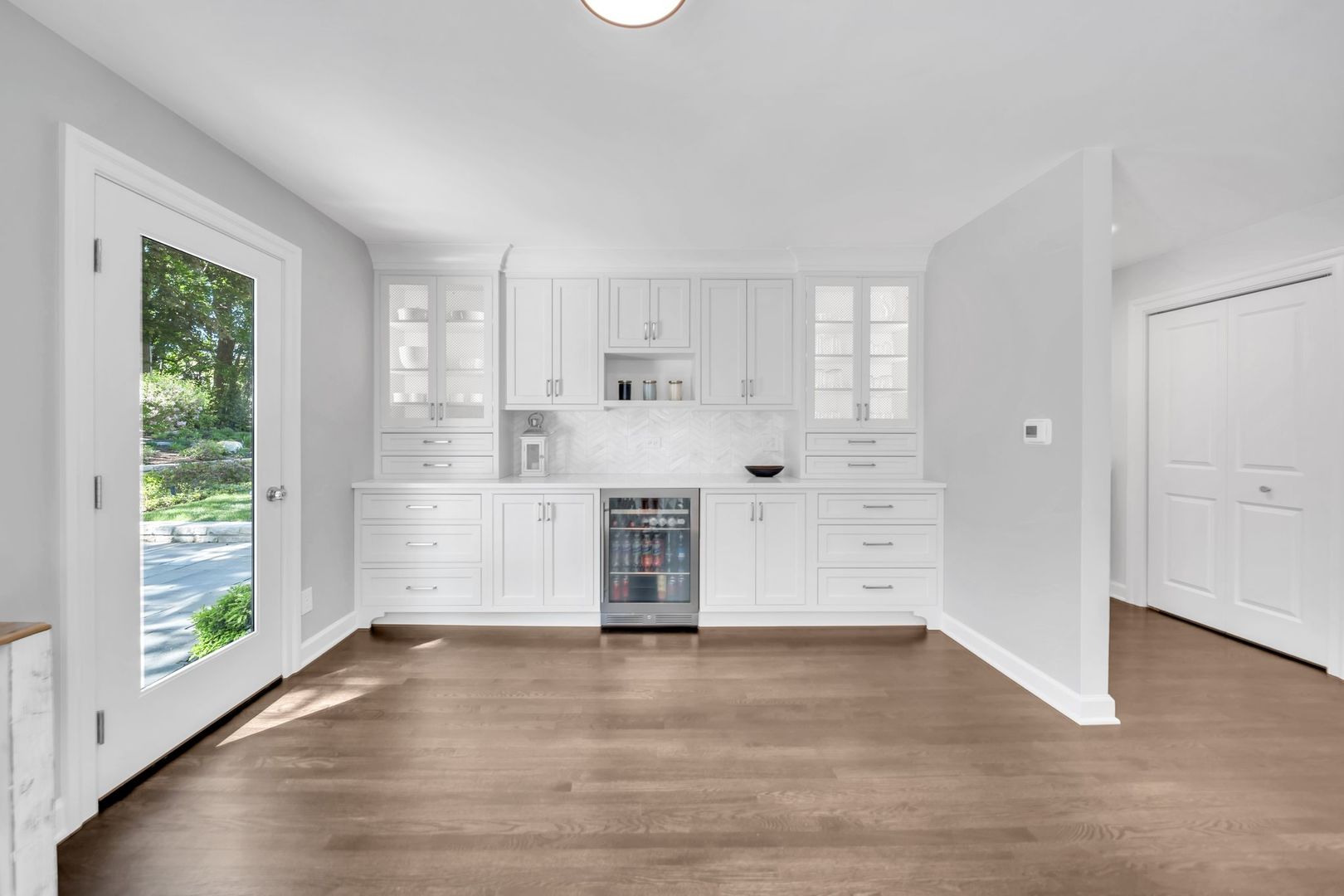 32 Otis Road Barrington Hills, IL 60010 - Photo 15 of 48 an empty room with wooden floor and windows