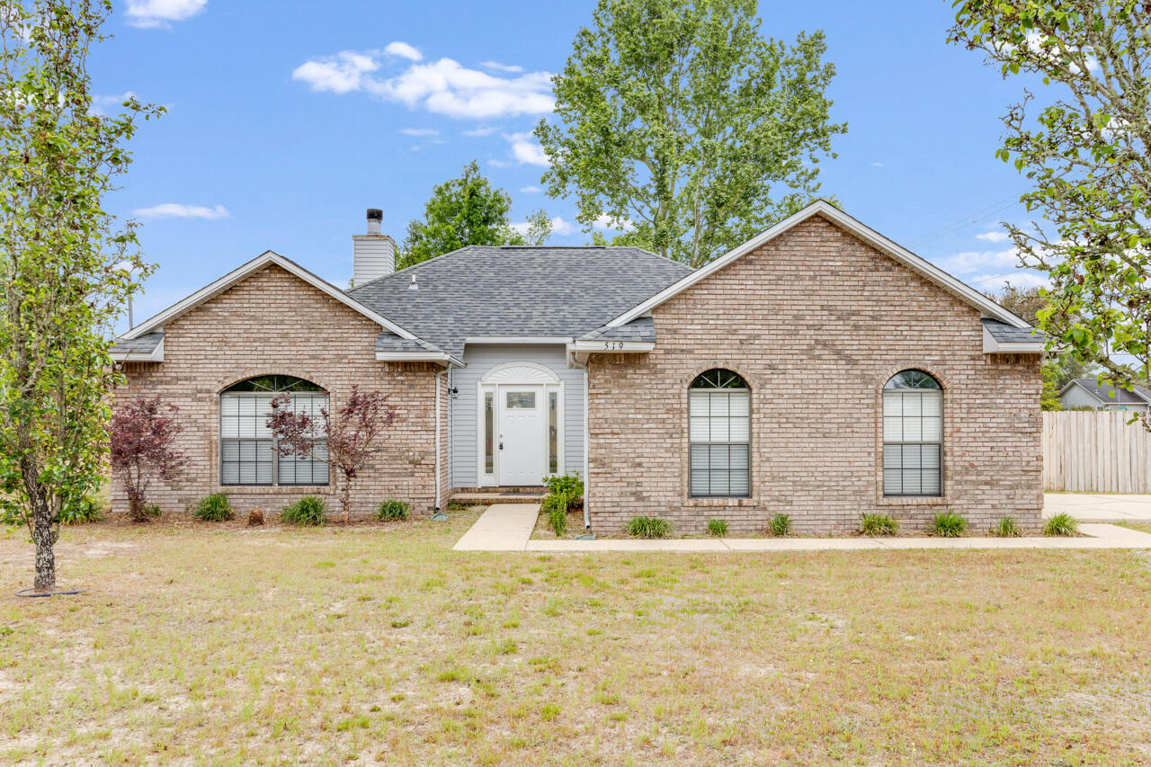 a front view of house with yard