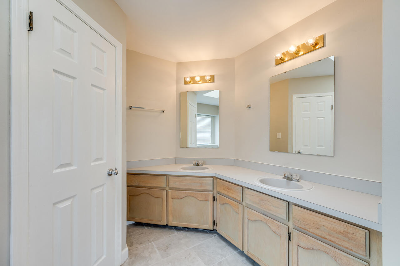 519 Krest Drive Crestview, FL 32536 - Photo 17 of 37 a spacious bathroom with a double vanity sink mirror and