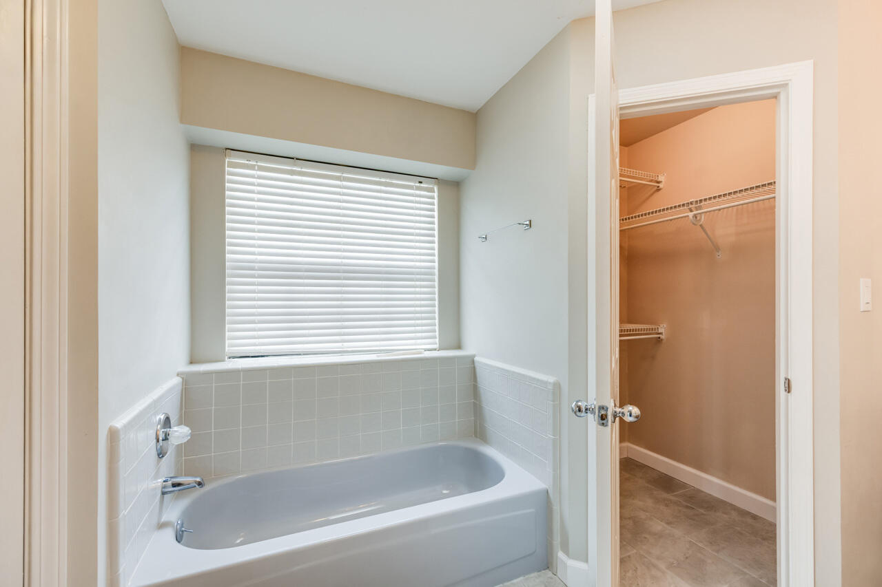 519 Krest Drive Crestview, FL 32536 - Photo 20 of 37 a white bath tub sitting next to a window