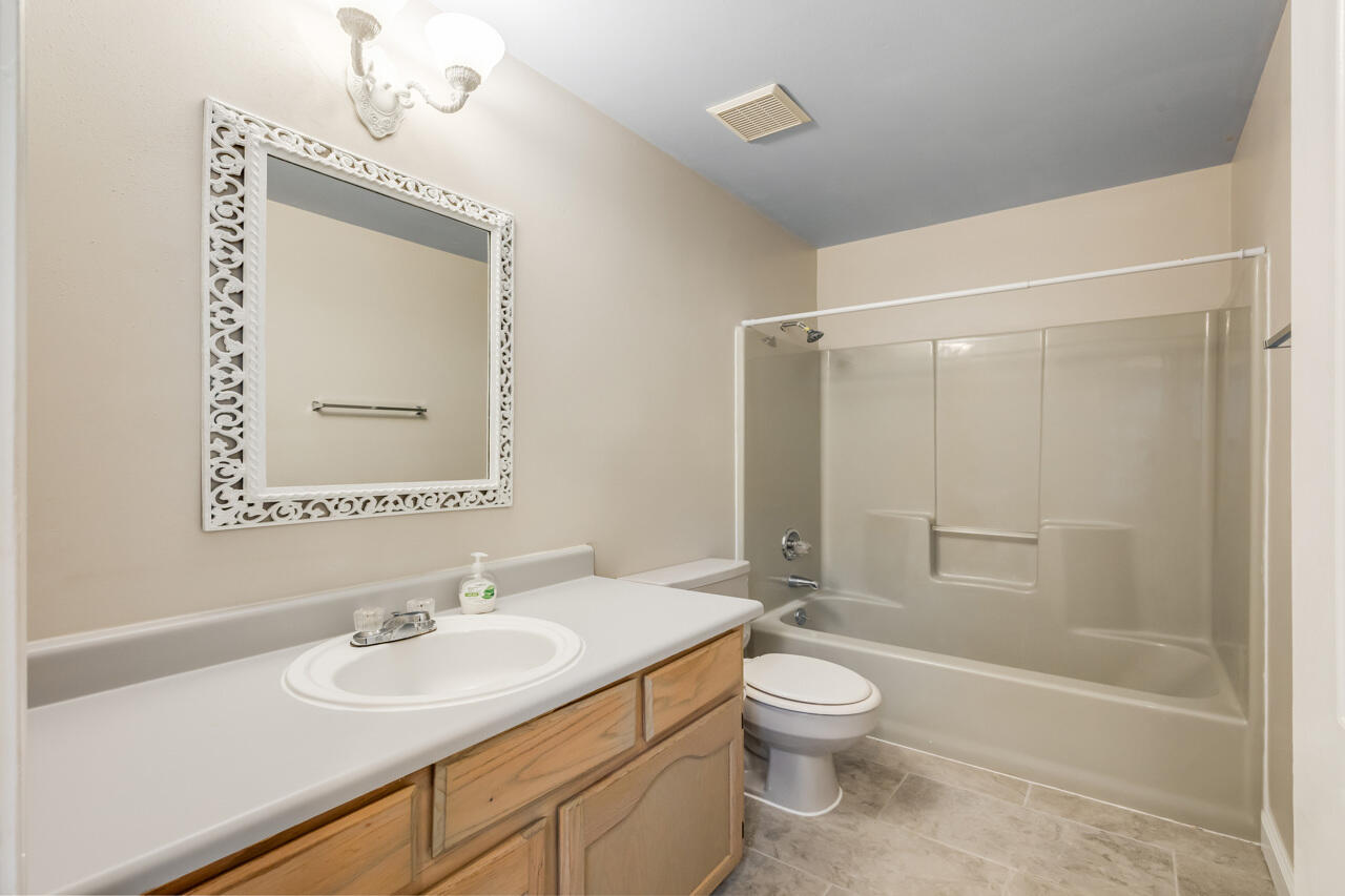 519 Krest Drive Crestview, FL 32536 - Photo 26 of 37 a bathroom with a toilet a sink and a bathtub