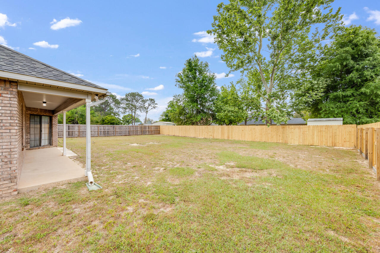 519 Krest Drive Crestview, FL 32536 - Photo 28 of 37 a view of an outdoor space and swimming pool