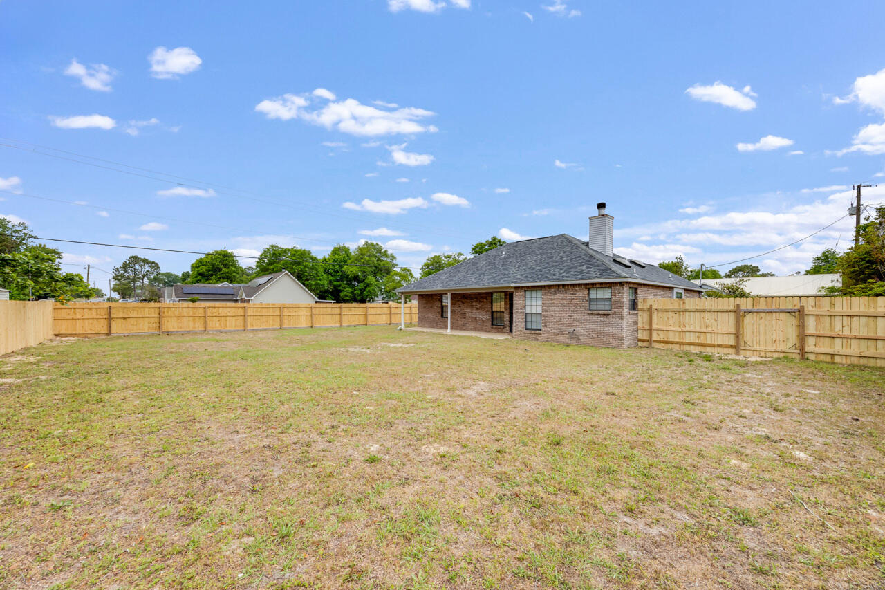519 Krest Drive Crestview, FL 32536 - Photo 31 of 37 a view of a house with a yard