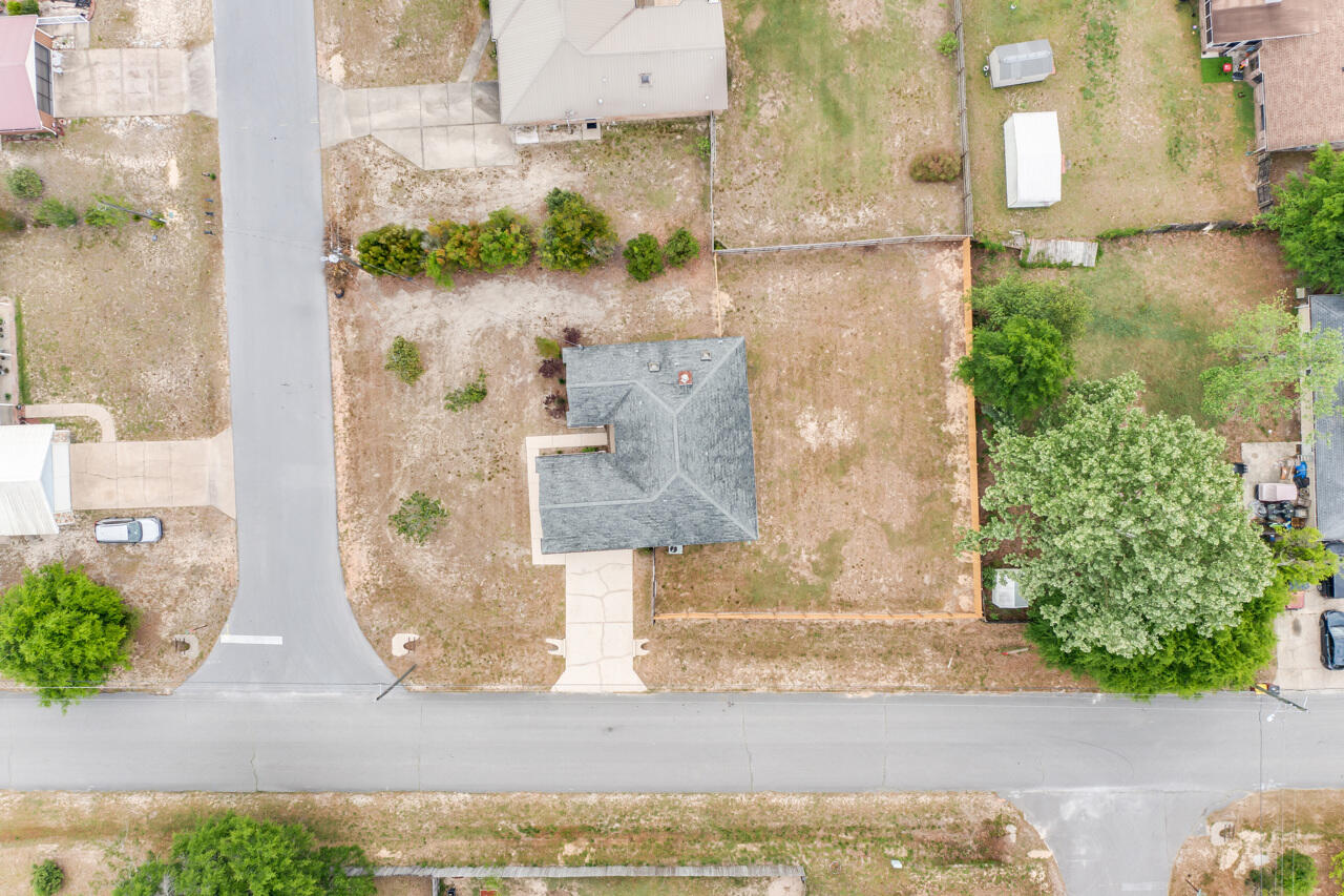 519 Krest Drive Crestview, FL 32536 - Photo 37 of 37 an aerial view of a house with a yard and a large parking space