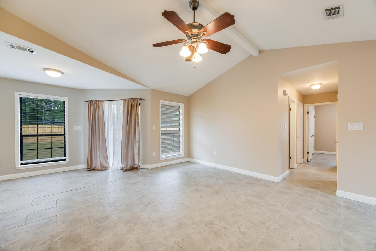 519 Krest Drive Crestview, FL 32536 - Photo 7 of 37 a view of an empty room with a window