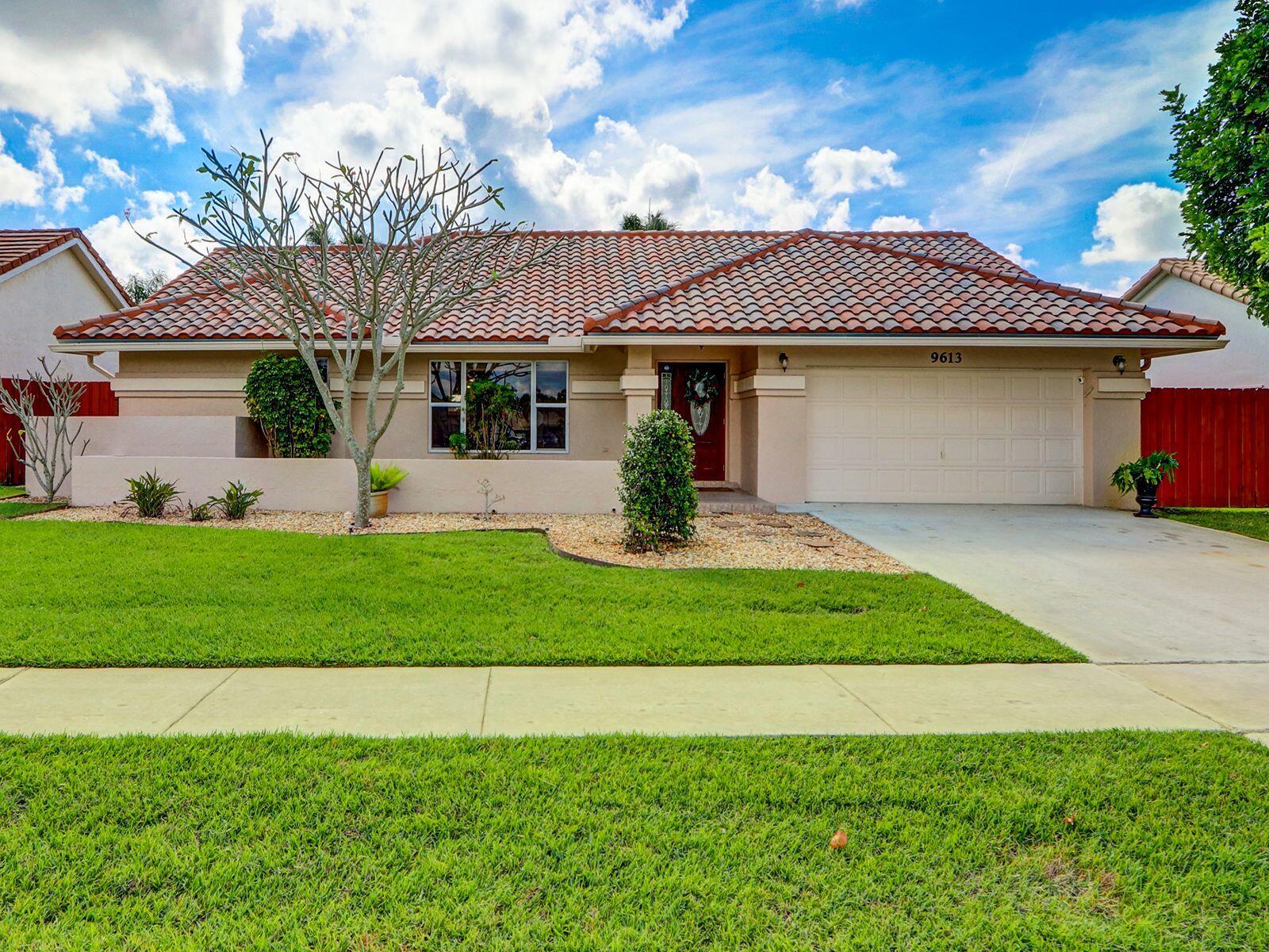 9613 El Clair Ranch Road Boynton Beach, FL 33437 - Photo 1 of 31 Front 3