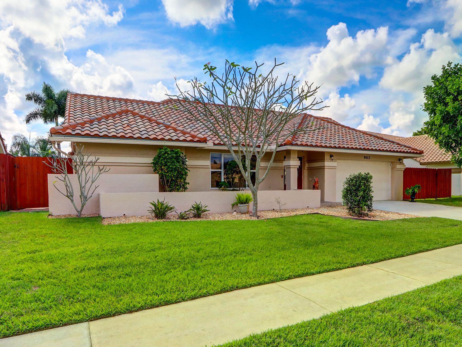 9613 El Clair Ranch Road Boynton Beach, FL 33437 - Photo 2 of 31 Front 2