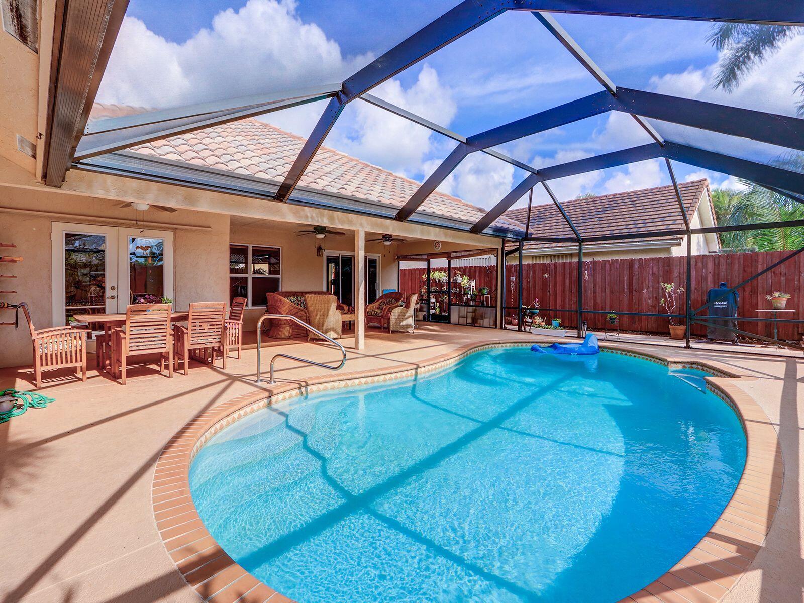 9613 El Clair Ranch Road Boynton Beach, FL 33437 - Photo 4 of 31 Pool Area Full 2