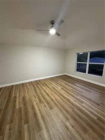 a bathroom with a glass door shower