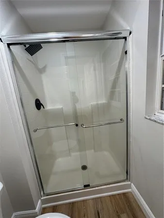 front view of a house with a large window