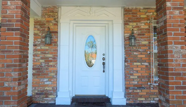 a front view of a house with a door