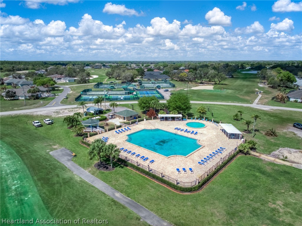 4734 Haw Branch Road, Unit 110 Sebring, FL 33875 - Photo 41 of 50 a view of a swimming pool and outdoor space