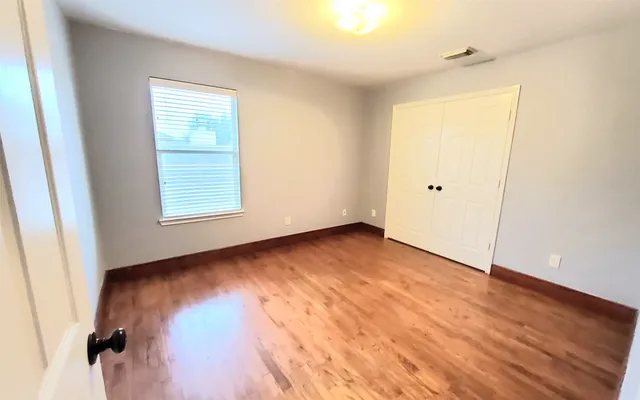 a bathroom with a sink vanity and a mirror