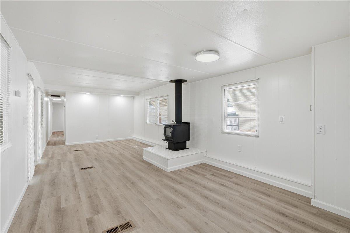 1525 Cold Springs Road, Unit 48 Placerville, CA 95667 - Photo 6 of 23 a view of empty room with wooden floor and window