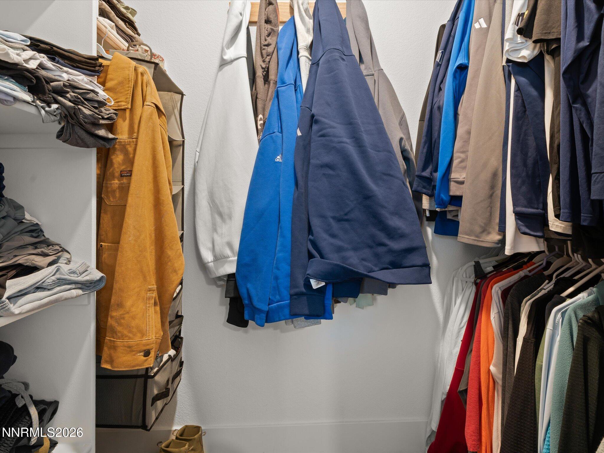 4233 Fawnridge Place Reno, NV 89523 - Photo 18 of 30 a view of walk in closet with clothes and shoes