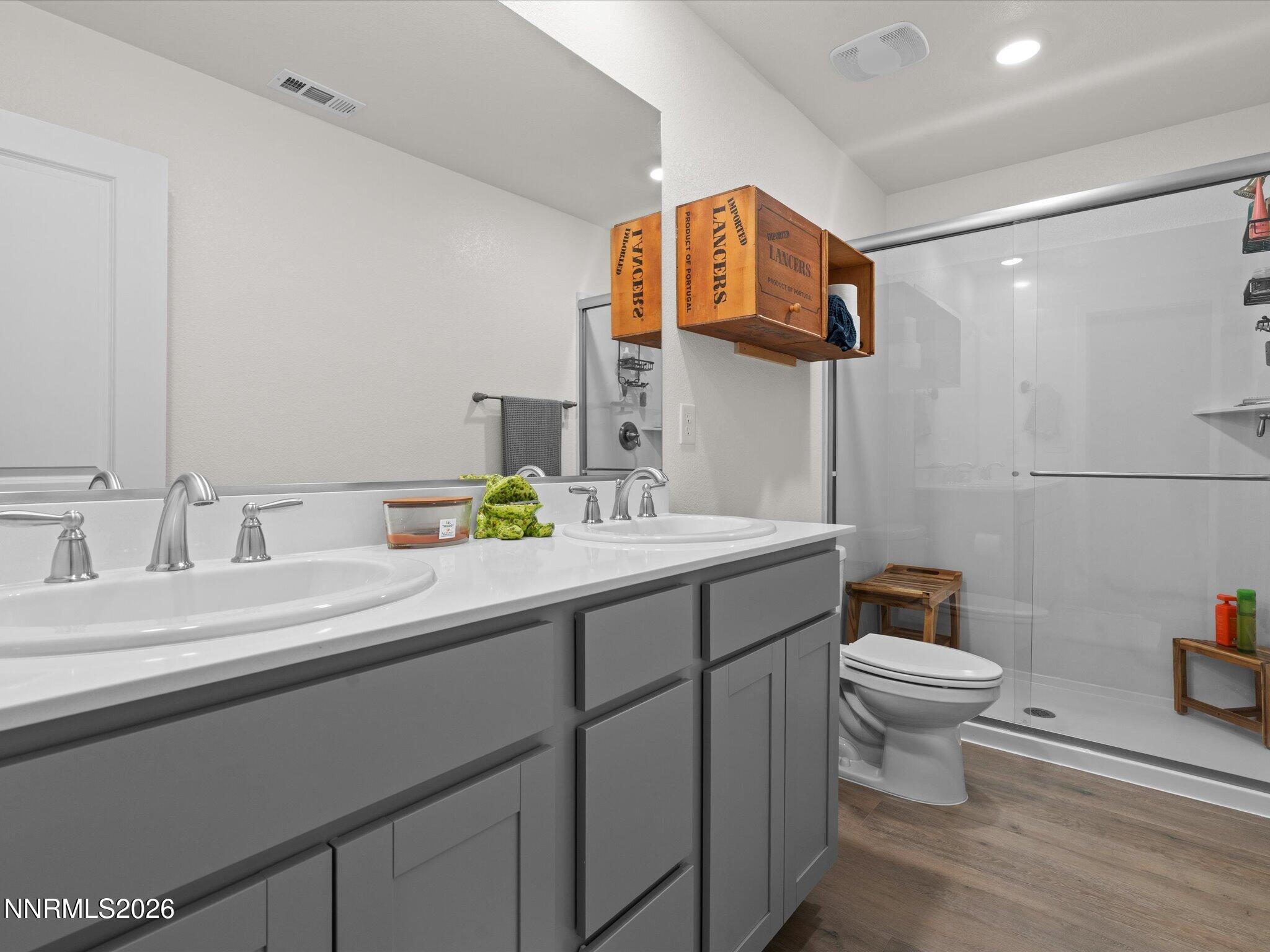 4233 Fawnridge Place Reno, NV 89523 - Photo 19 of 30 a bathroom with a sink and a toilet