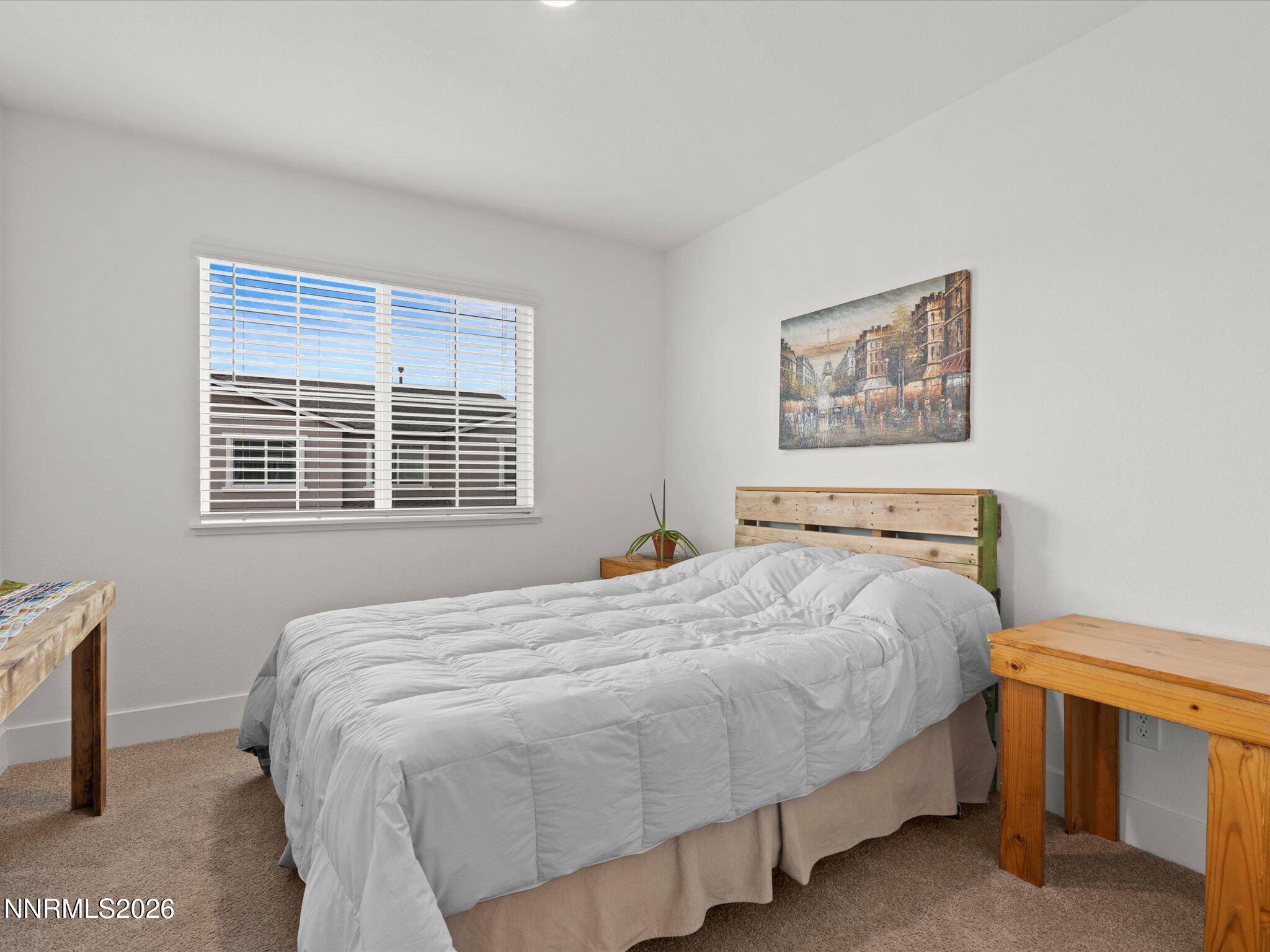 4233 Fawnridge Place Reno, NV 89523 - Photo 20 of 30 a bedroom with a bed and a window