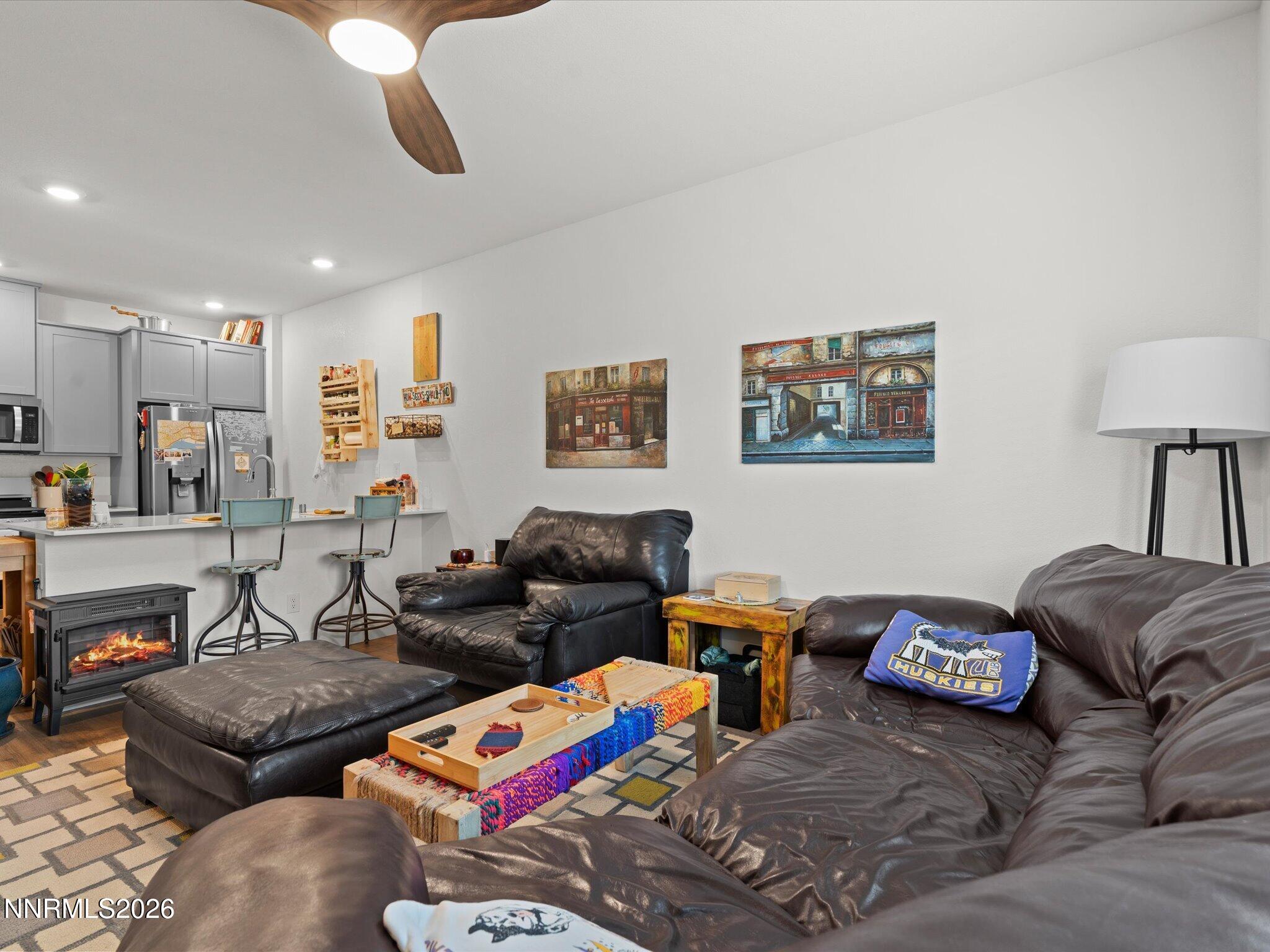 4233 Fawnridge Place Reno, NV 89523 - Photo 6 of 30 a living room with furniture and a couch