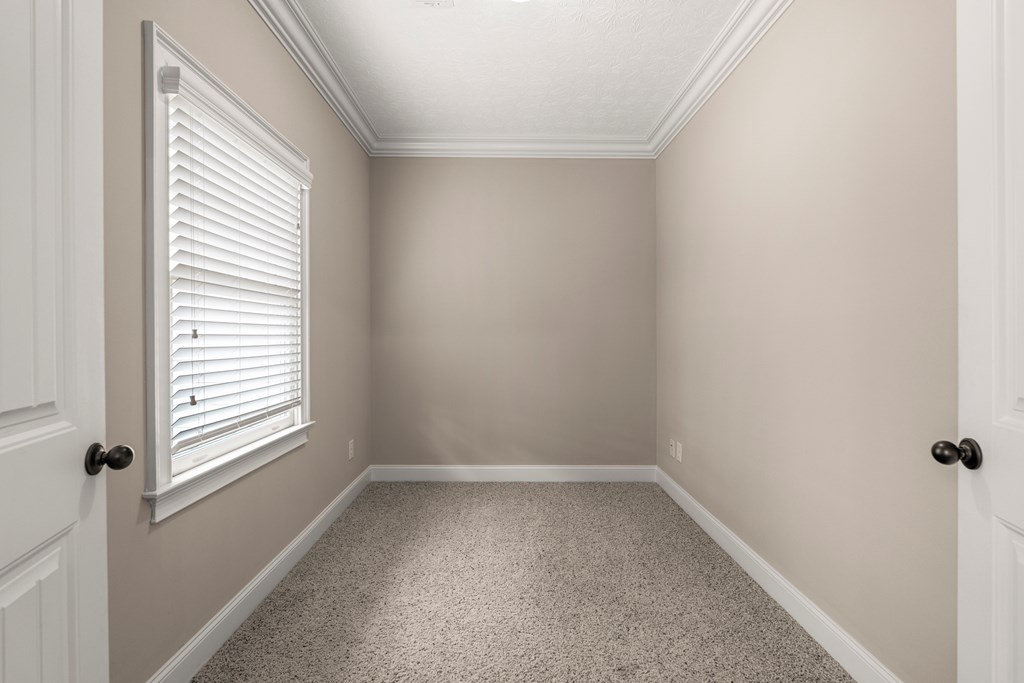 8026 Splendor Way Columbus, GA 31904 - Photo 29 of 44 an empty room with a window
