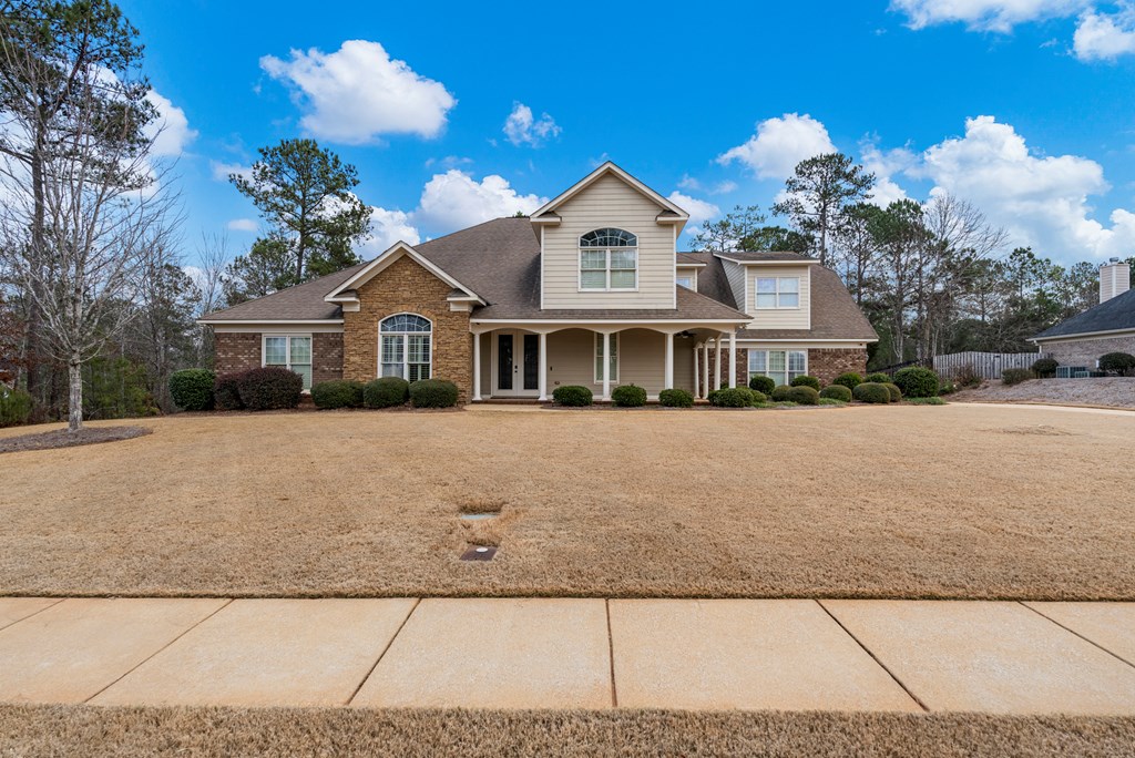8026 Splendor Way Columbus, GA 31904 - Photo 38 of 44 a front view of a house with a yard