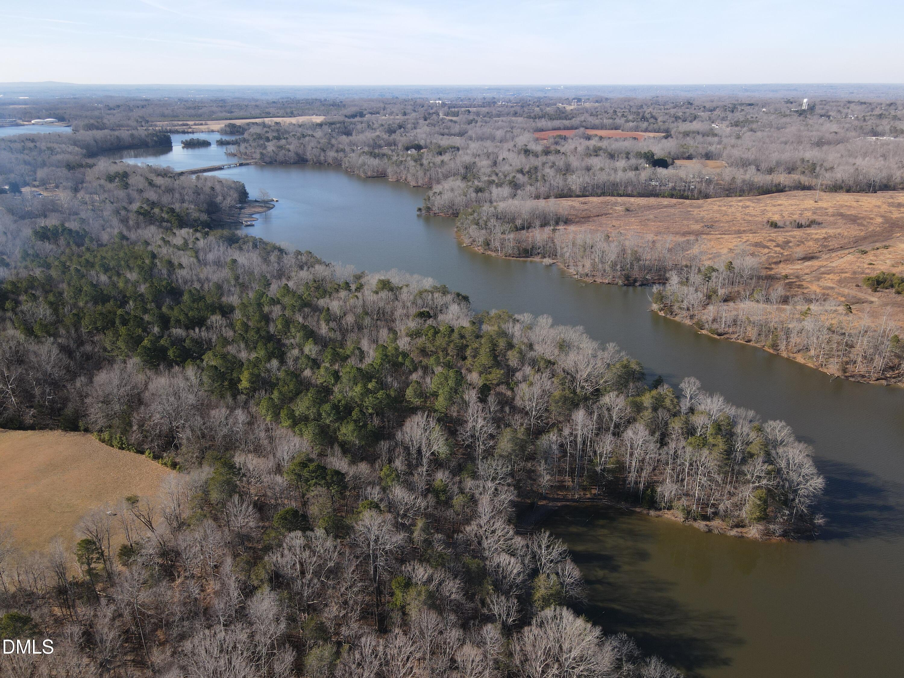 0 Bason Road Mebane, NC 27302 - Photo 18 of 34 a view of a lake with a city