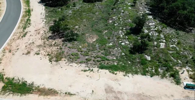 a view of a yard covered with snow