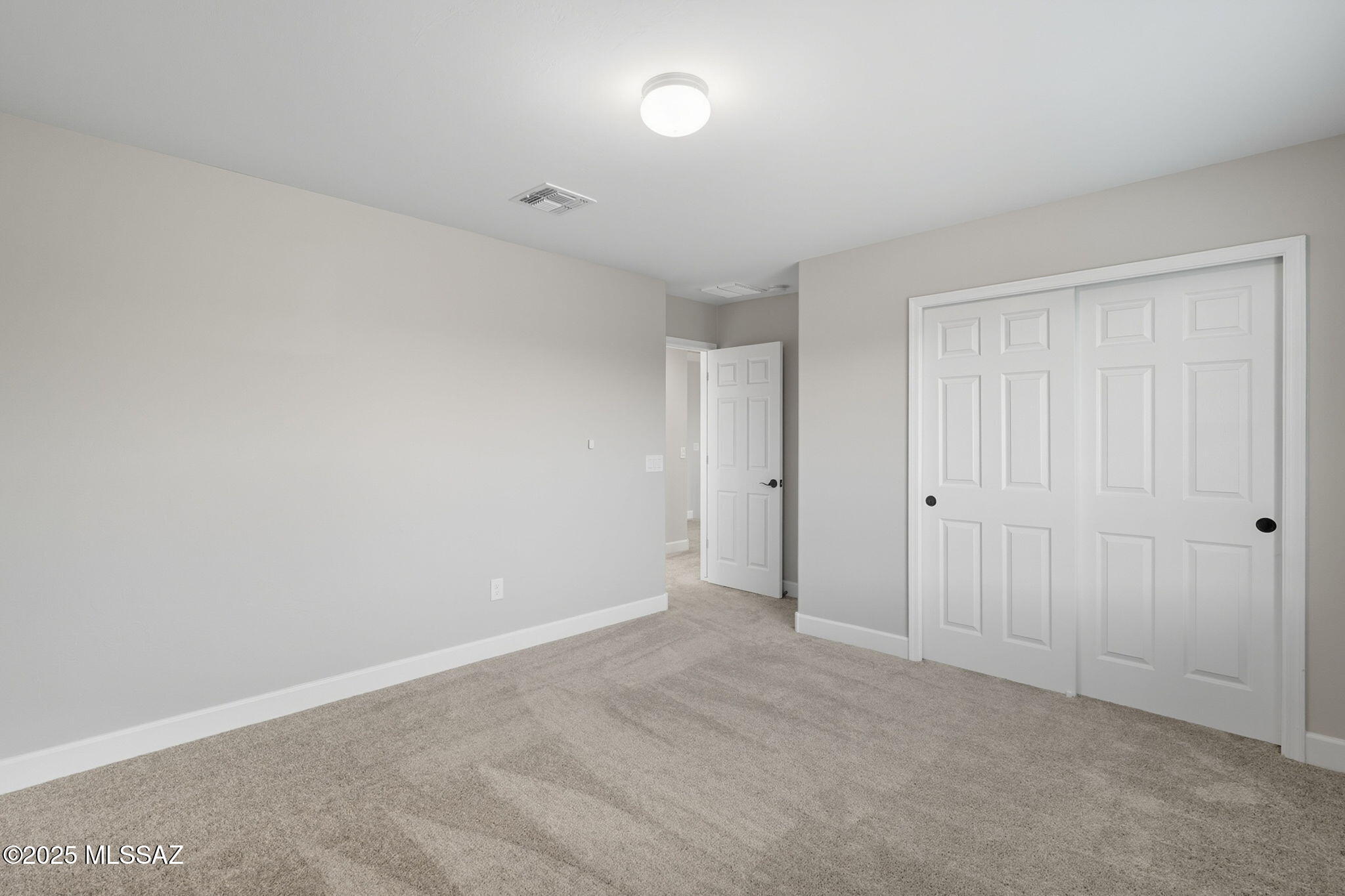12100 East Ryscott Circle Vail, AZ 85641 - Photo 33 of 53 a view of an empty room and a window
