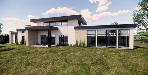 a view of a house with sitting area and furniture