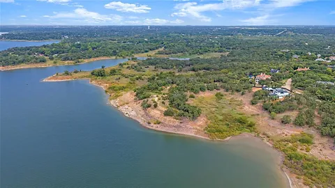 a view of a lake with a city