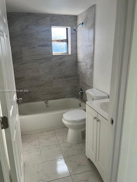 435 Southwest 9th Avenue, Unit 209 Homestead, FL 33030 - Photo 6 of 6 a bathroom with a toilet and a bathtub
