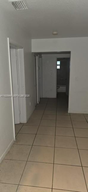 435 Southwest 9th Avenue, Unit 209 Homestead, FL 33030 - Photo 7 of 8 a view of a closet area