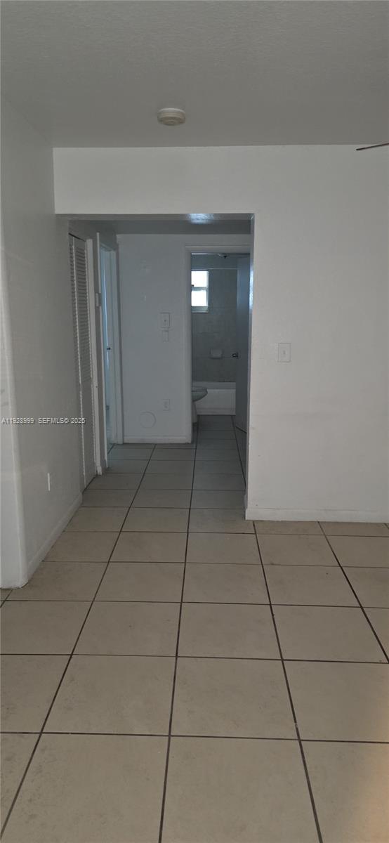 435 Southwest 9th Avenue, Unit 209 Homestead, FL 33030 - Photo 8 of 8 a view of empty room