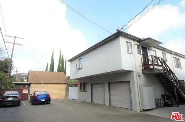 a car parked in front of a house