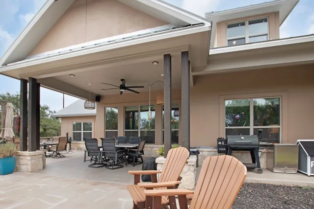 a view of a swimming pool with a patio