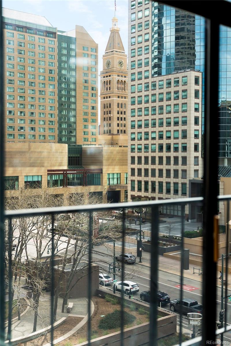 1777 Larimer Street, Unit 710 Denver, CO 80202 - Photo 34 of 47 a view of a large building from a balcony