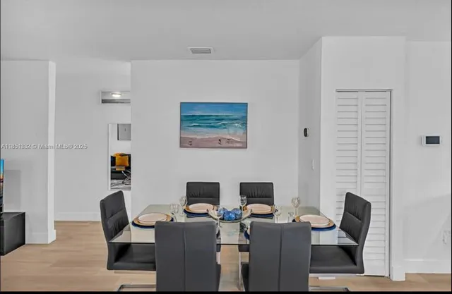 a view of a workspace with furniture