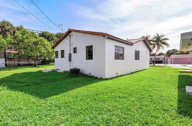 a view of a backyard with a garden