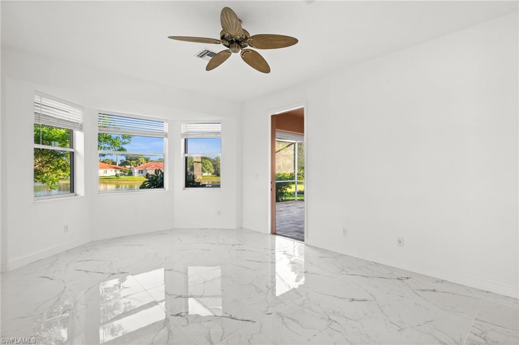 3972 Ruxton Road Naples, FL 34116 - Photo 16 of 41 a view of an empty room and window