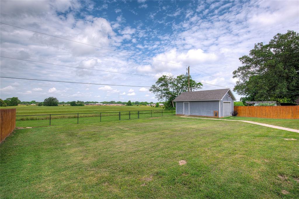 2027 Park Springs Road Sulphur Springs, TX 75482 - Photo 35 of 39 a view of a house with a yard