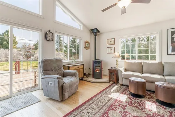 a dining room with furniture window and outside view