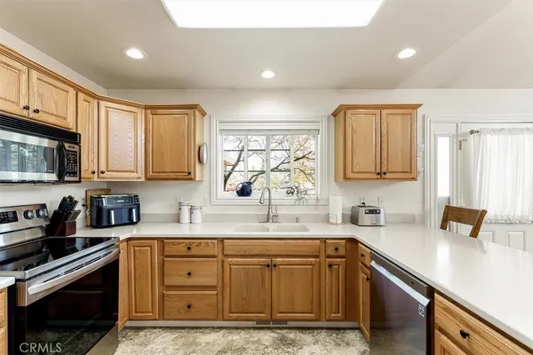 a bed room with a bed and a tv