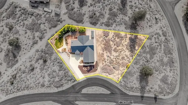 a view of mountain and an ocean