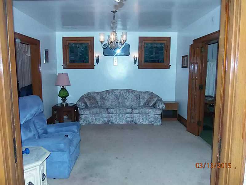 1414 Beaver Road Ambridge, PA 15003 - Photo 3 of 13 Living Room. Beautiful stained glass accents