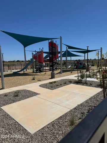 a table tennis table and chairs in patio yard
