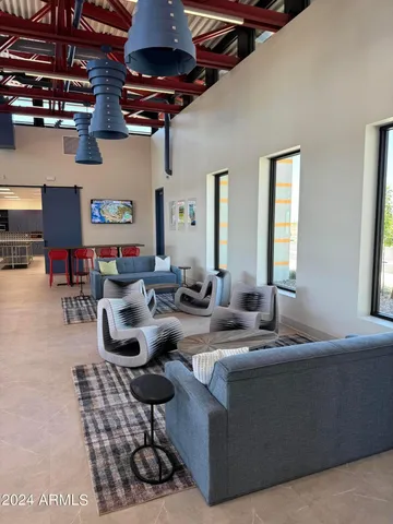 a kitchen with stainless steel appliances a sink and a refrigerator