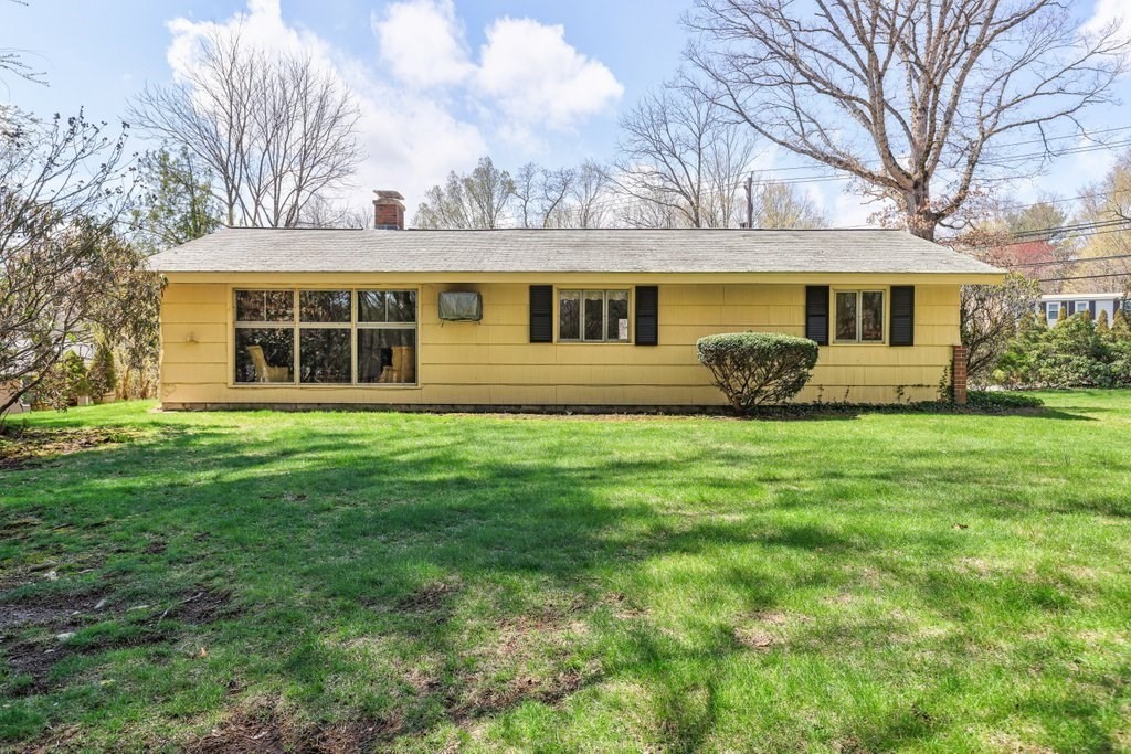 617 Edgell Road Framingham, MA 01701 - Photo 23 of 26 front view of a house with a yard