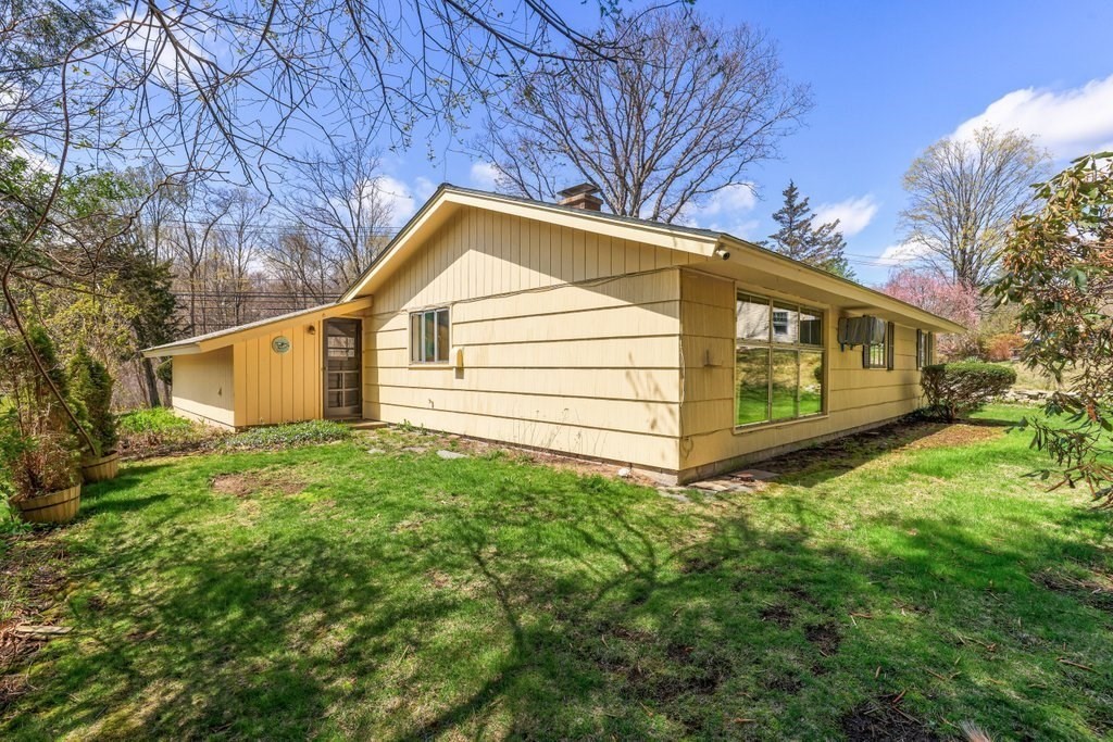 617 Edgell Road Framingham, MA 01701 - Photo 24 of 26 a view of a house with a yard