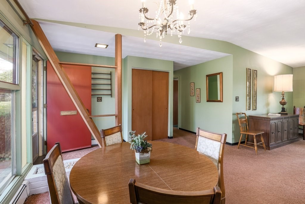 617 Edgell Road Framingham, MA 01701 - Photo 3 of 26 a dining room with furniture and wooden floor