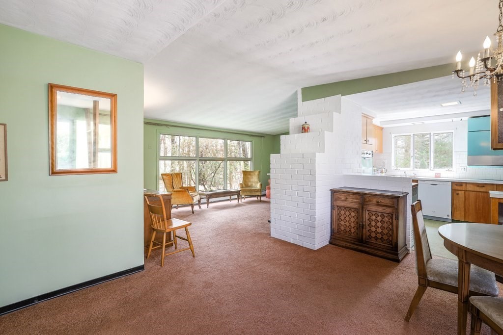 617 Edgell Road Framingham, MA 01701 - Photo 6 of 26 a living room with furniture and a fireplace